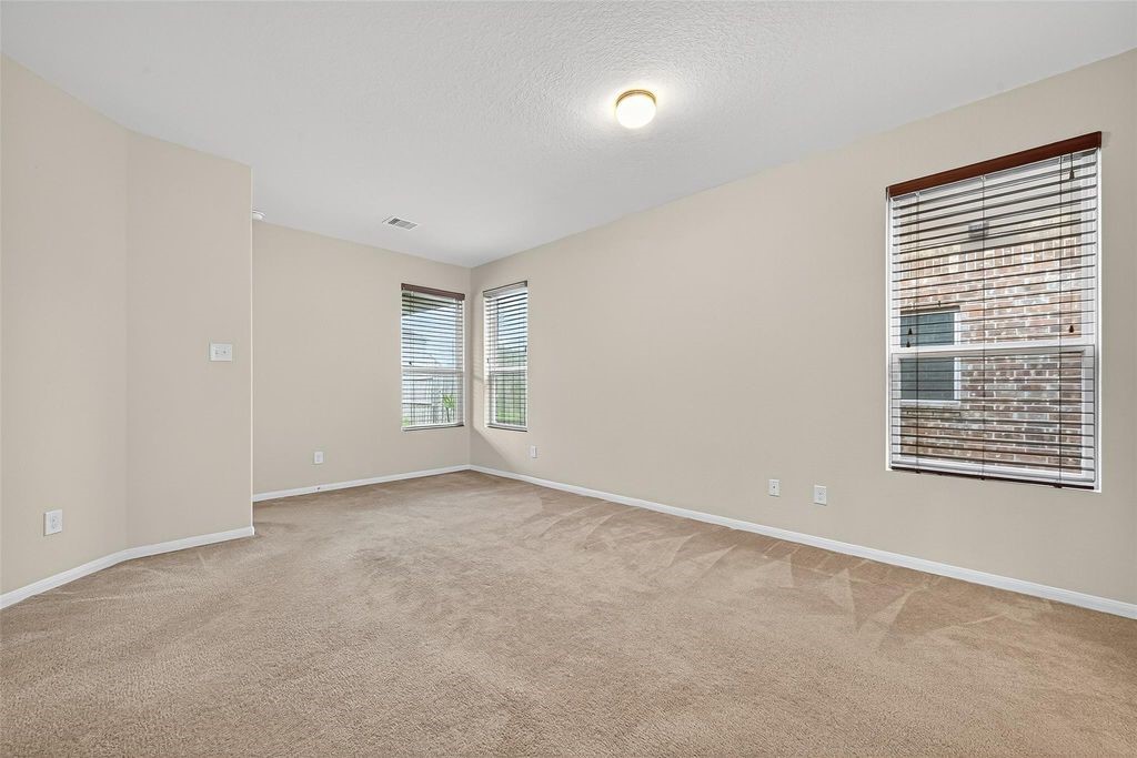3218 Dappled Vale Trail Spring, TX 77373 - Photo 24 of 47 a view of an empty room with a window