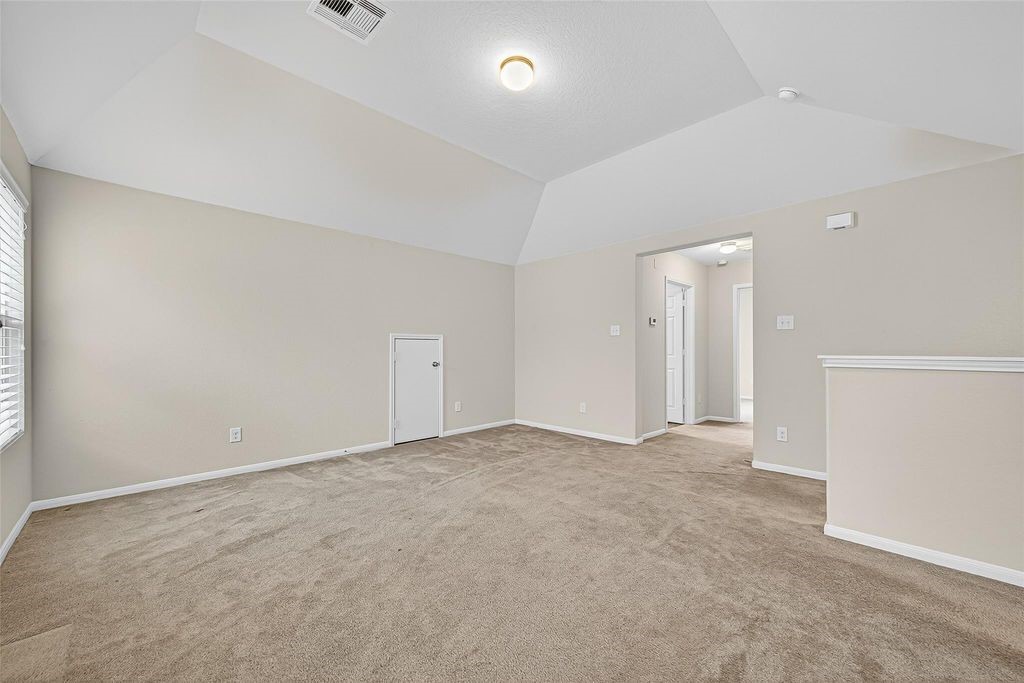 3218 Dappled Vale Trail Spring, TX 77373 - Photo 34 of 47 an empty room with an entryway