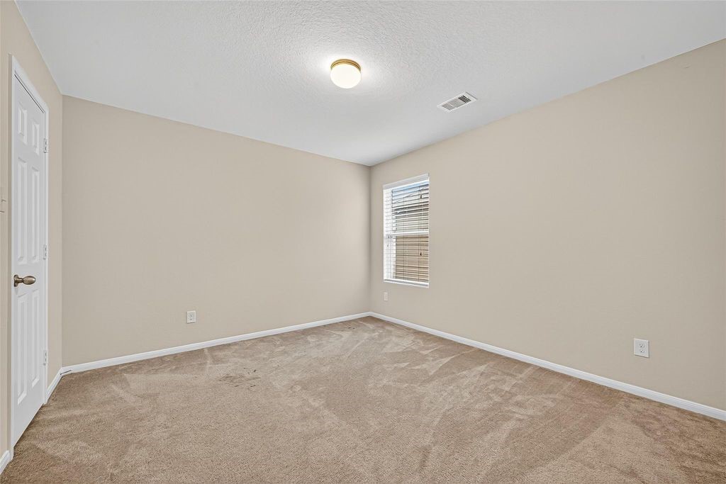 3218 Dappled Vale Trail Spring, TX 77373 - Photo 35 of 47 a view of an empty room with a window
