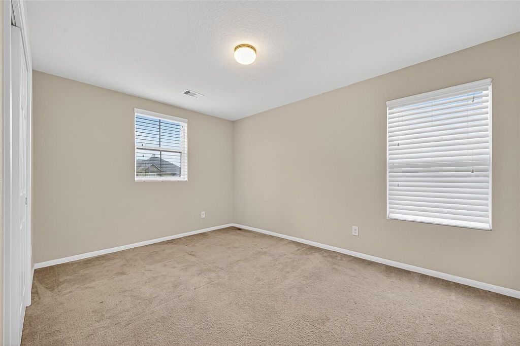 3218 Dappled Vale Trail Spring, TX 77373 - Photo 38 of 47 an empty room with a window