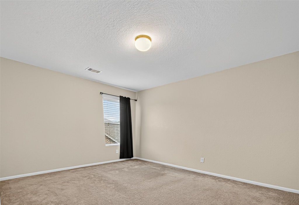 3218 Dappled Vale Trail Spring, TX 77373 - Photo 42 of 47 a view of an empty room with a window