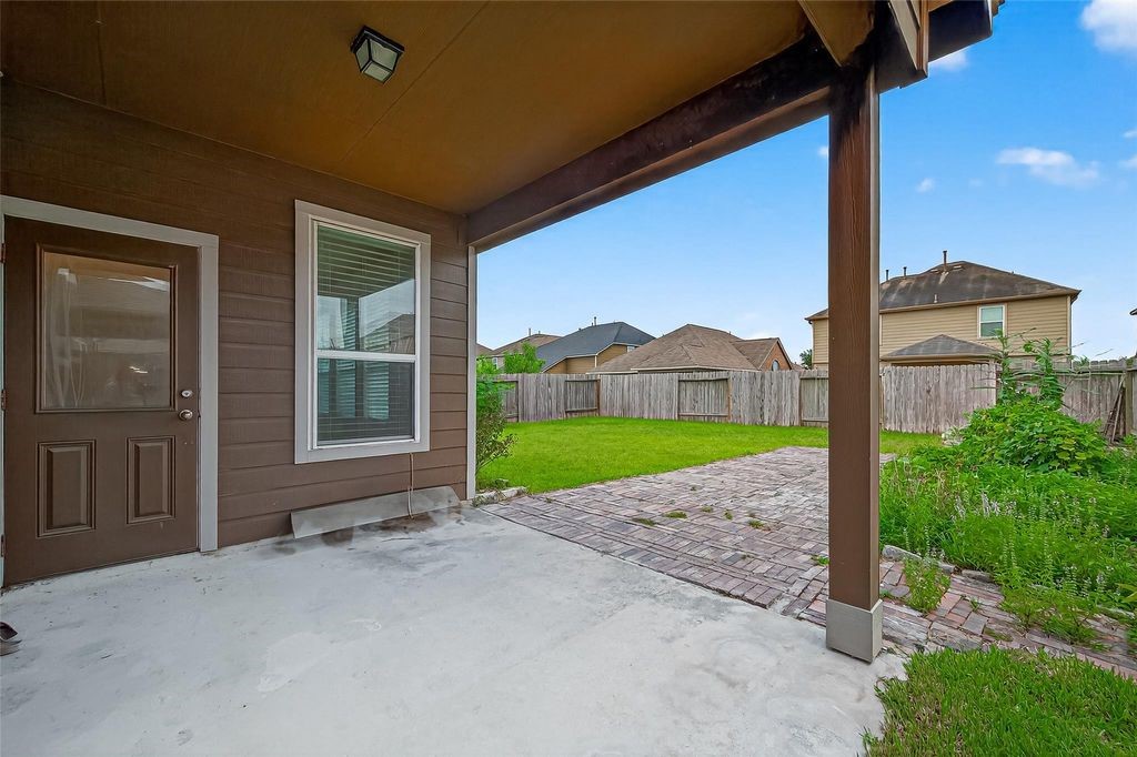 3218 Dappled Vale Trail Spring, TX 77373 - Photo 43 of 47 a view of a house with backyard and a porch