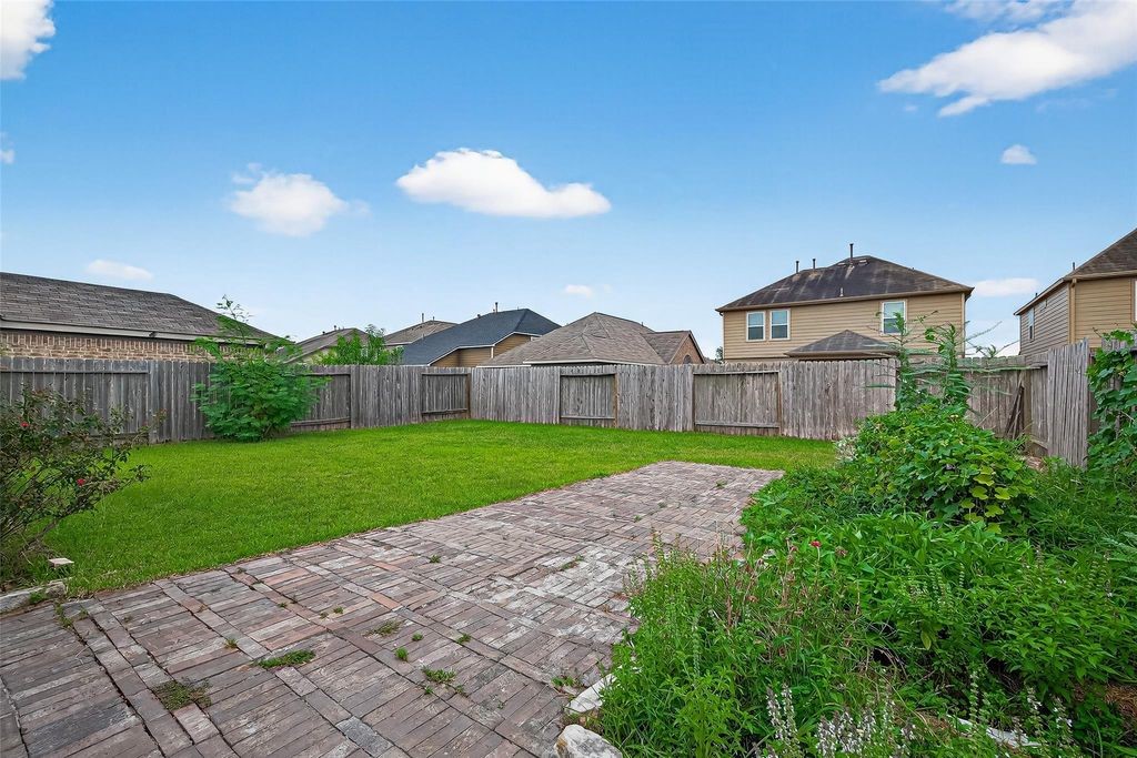 3218 Dappled Vale Trail Spring, TX 77373 - Photo 44 of 47 a view of a big house with a big yard and large trees