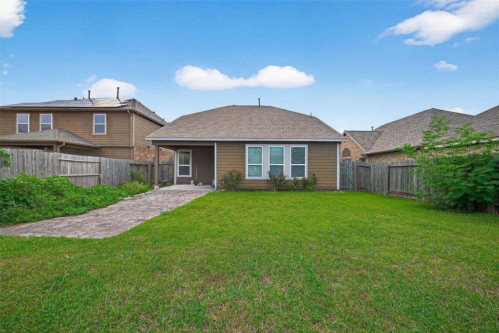 3218 Dappled Vale Trail Spring, TX 77373 - Photo 46 of 47 a view of a house with a backyard