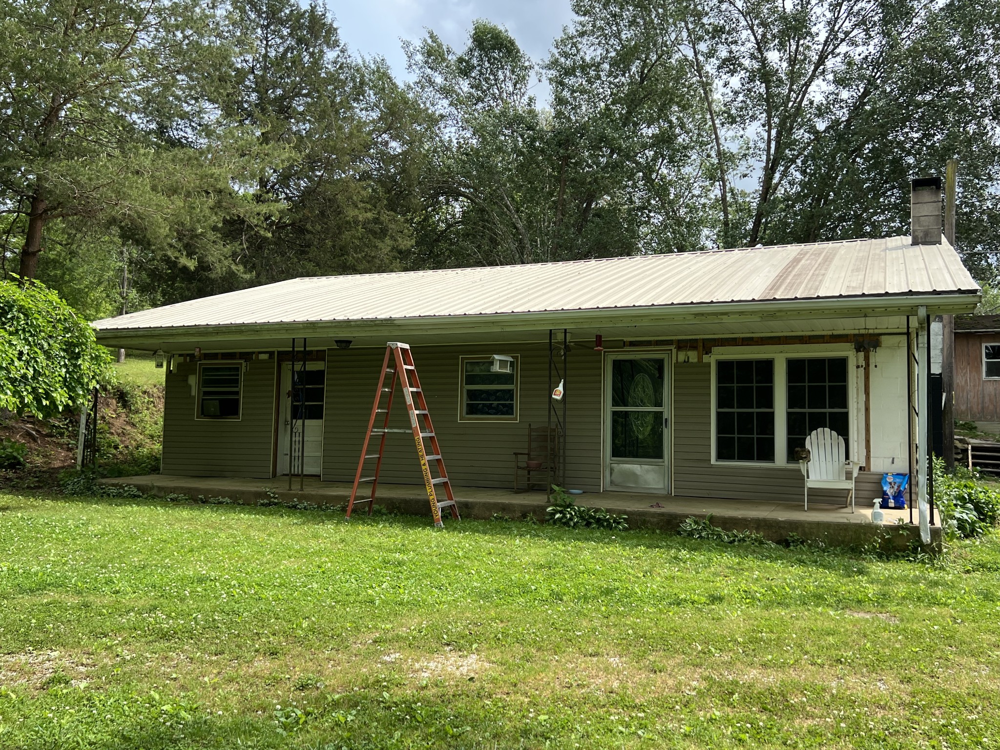 651 Allen Chapel Road Hilham, TN 38568 - Photo 1 of 48 a view of a house with garden
