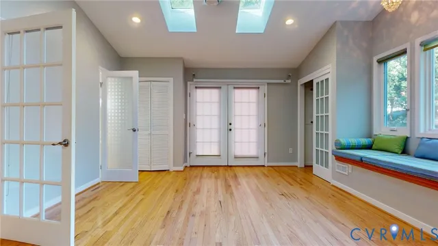 a view of entryway with wooden floor