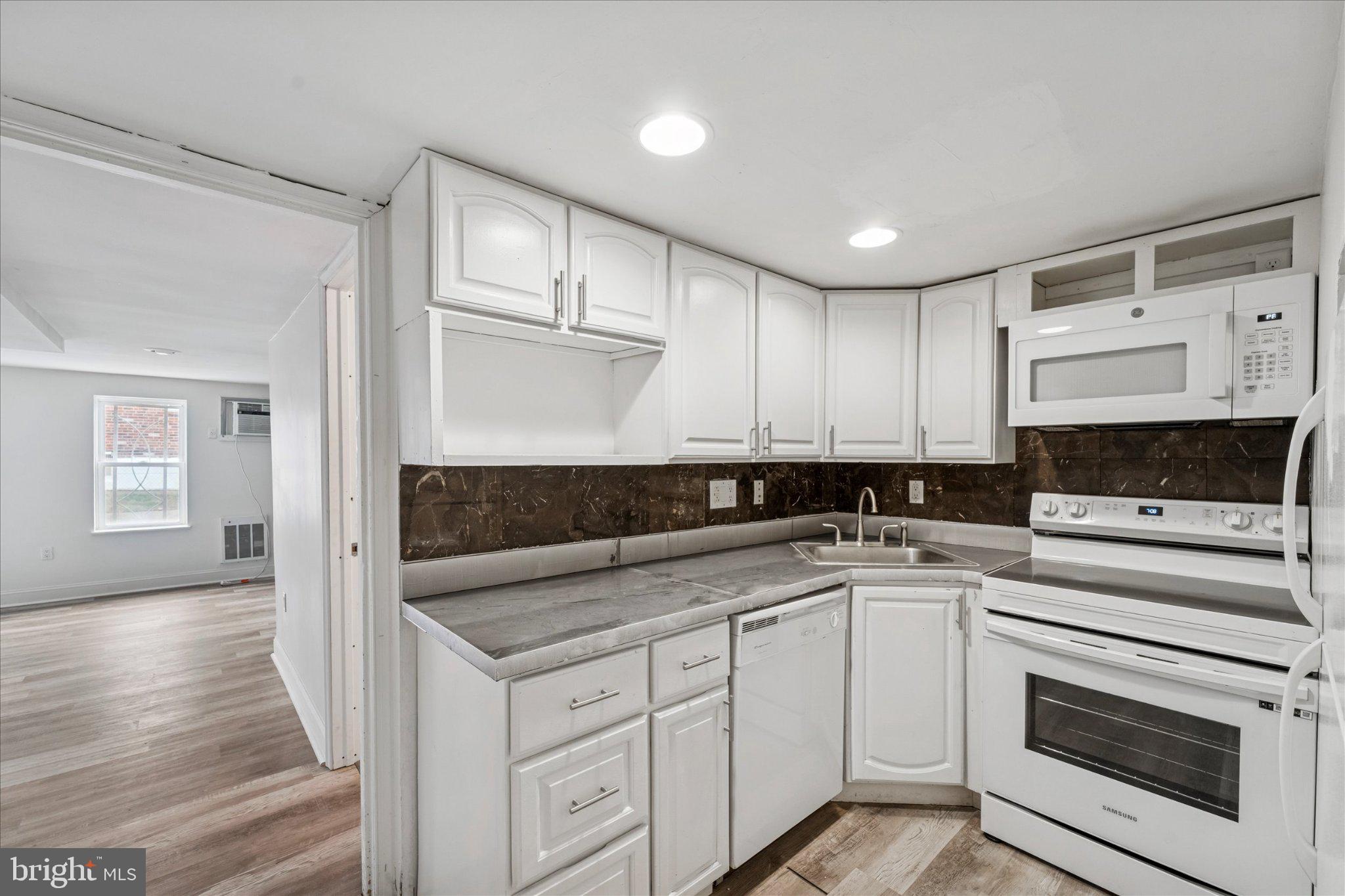 2659 Daphne Road Philadelphia, PA 19131 - Photo 25 of 34 Modern kitchen with sleek finishes.
