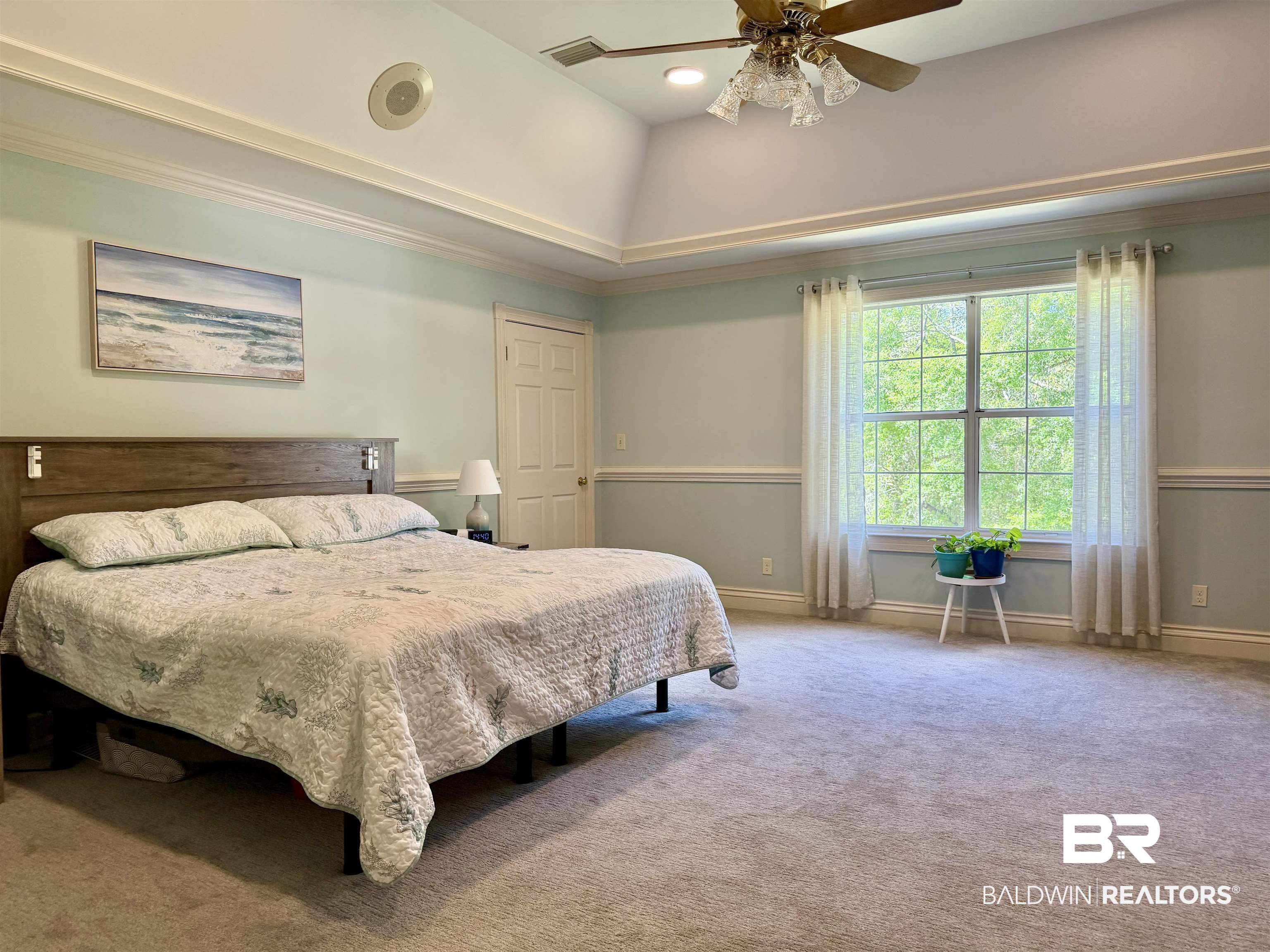 2944 Appleton Road Brewton, AL 36426 - Photo 13 of 65 Carpeted bedroom featuring a ceiling fan and a tray ceiling