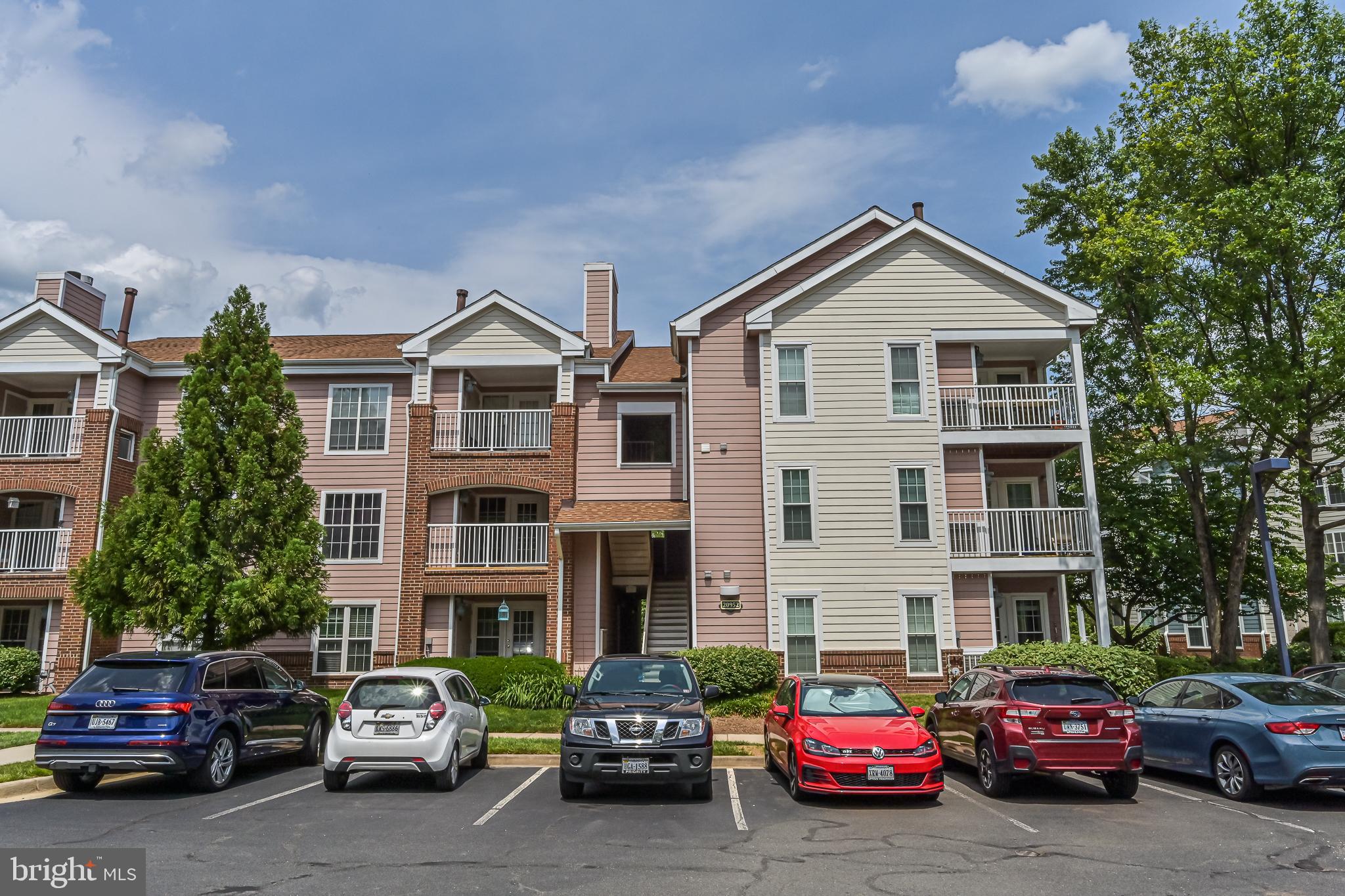 20952 Timber Ridge Terrace, Unit 103 Ashburn, VA 20147 - Photo 2 of 24 Abundant unassigned parking