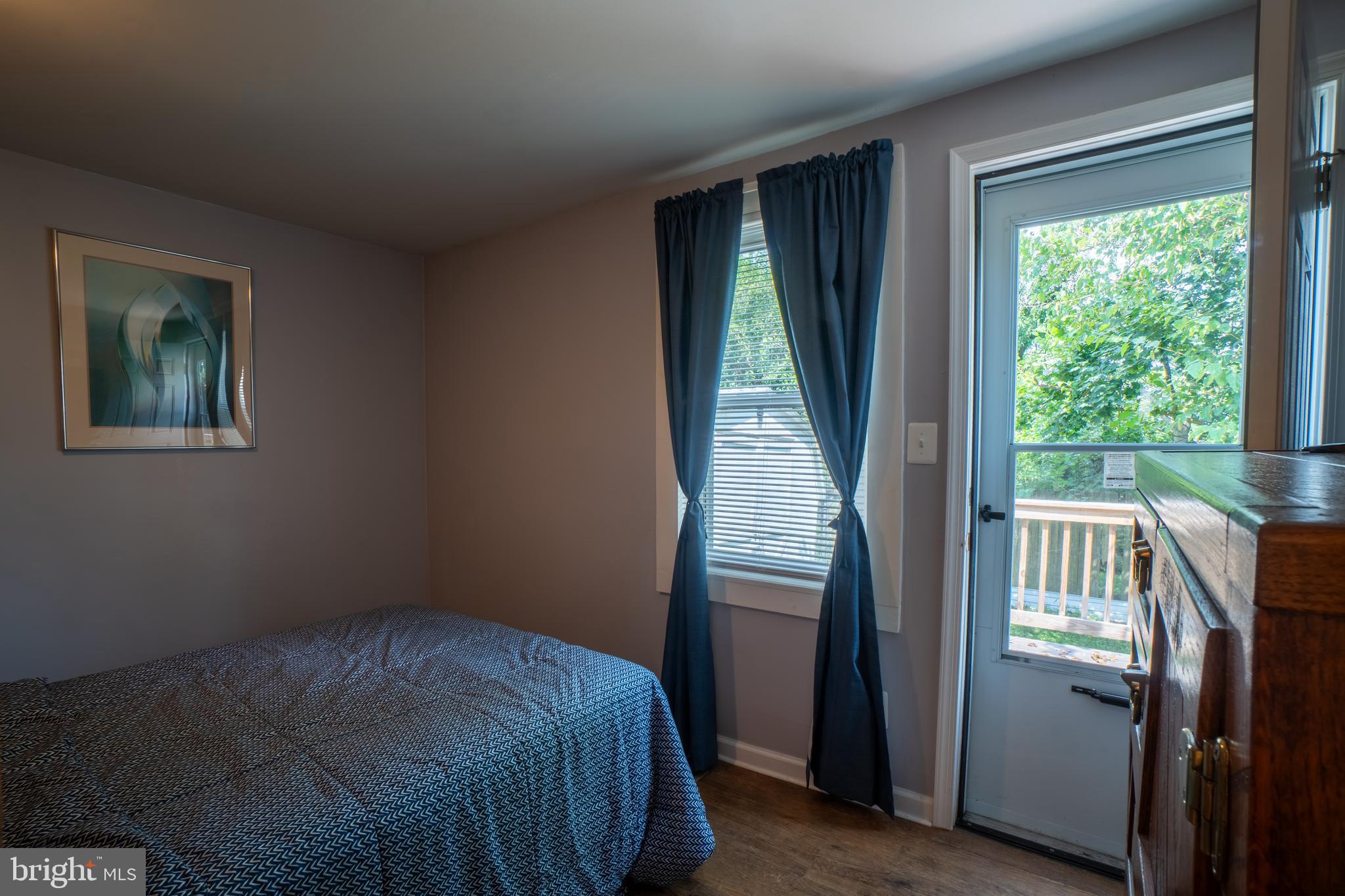 4415 Fairhaven Avenue Curtis Bay, MD 21226 - Photo 12 of 27 a bedroom with a bed and a window