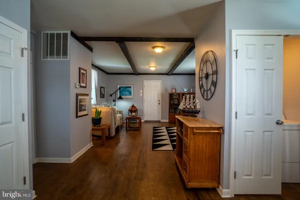 a bed room with furniture and a window