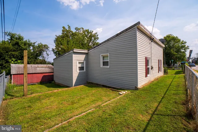 a view of a backyard with a garden