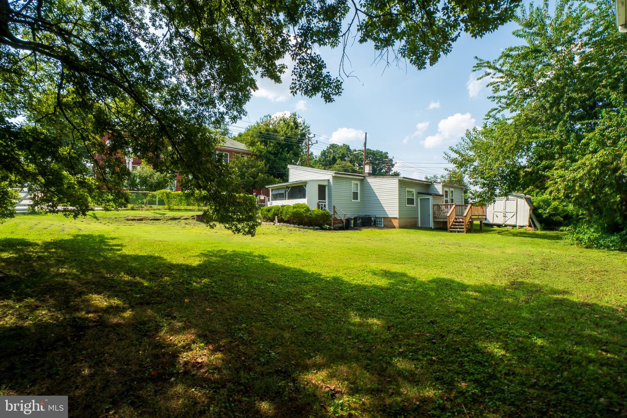 4415 Fairhaven Avenue Curtis Bay, MD 21226 - Photo 19 of 27 a view of a house with a big yard
