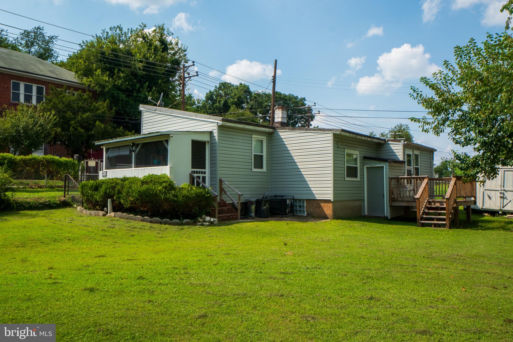 4415 Fairhaven Avenue Curtis Bay, MD 21226 - Photo 20 of 27 a view of a house with a yard and sitting area