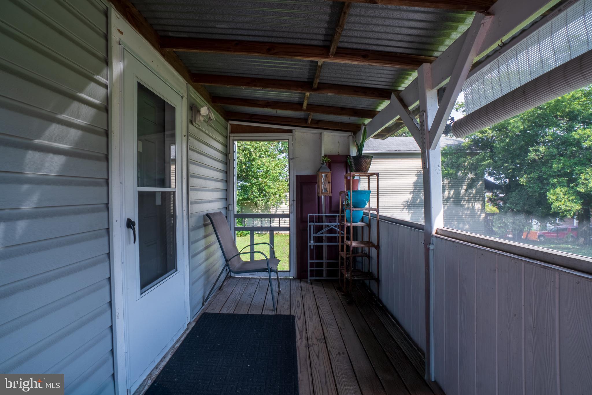 4415 Fairhaven Avenue Curtis Bay, MD 21226 - Photo 2 of 27 a view of entryway with a wooden deck