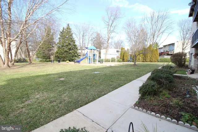a view of a yard with a fountain
