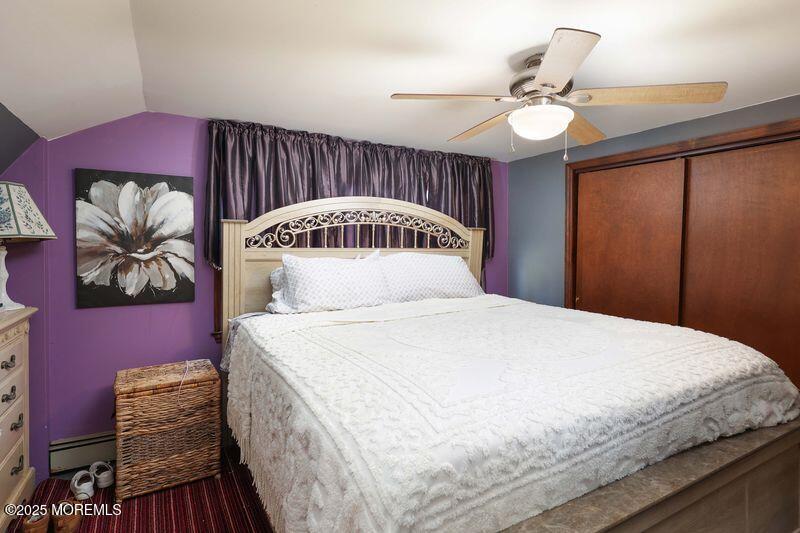 47-49 Appleton Avenue Leonardo, NJ 07737 - Photo 24 of 44 a bedroom with a bed and a chandelier