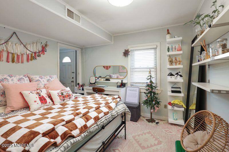 47-49 Appleton Avenue Leonardo, NJ 07737 - Photo 35 of 44 a bedroom with a bed and a couch