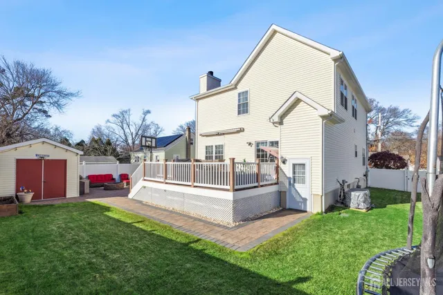 a view of house with yard and entertaining space