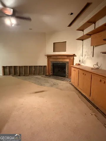 a kitchen with sink and cabinets