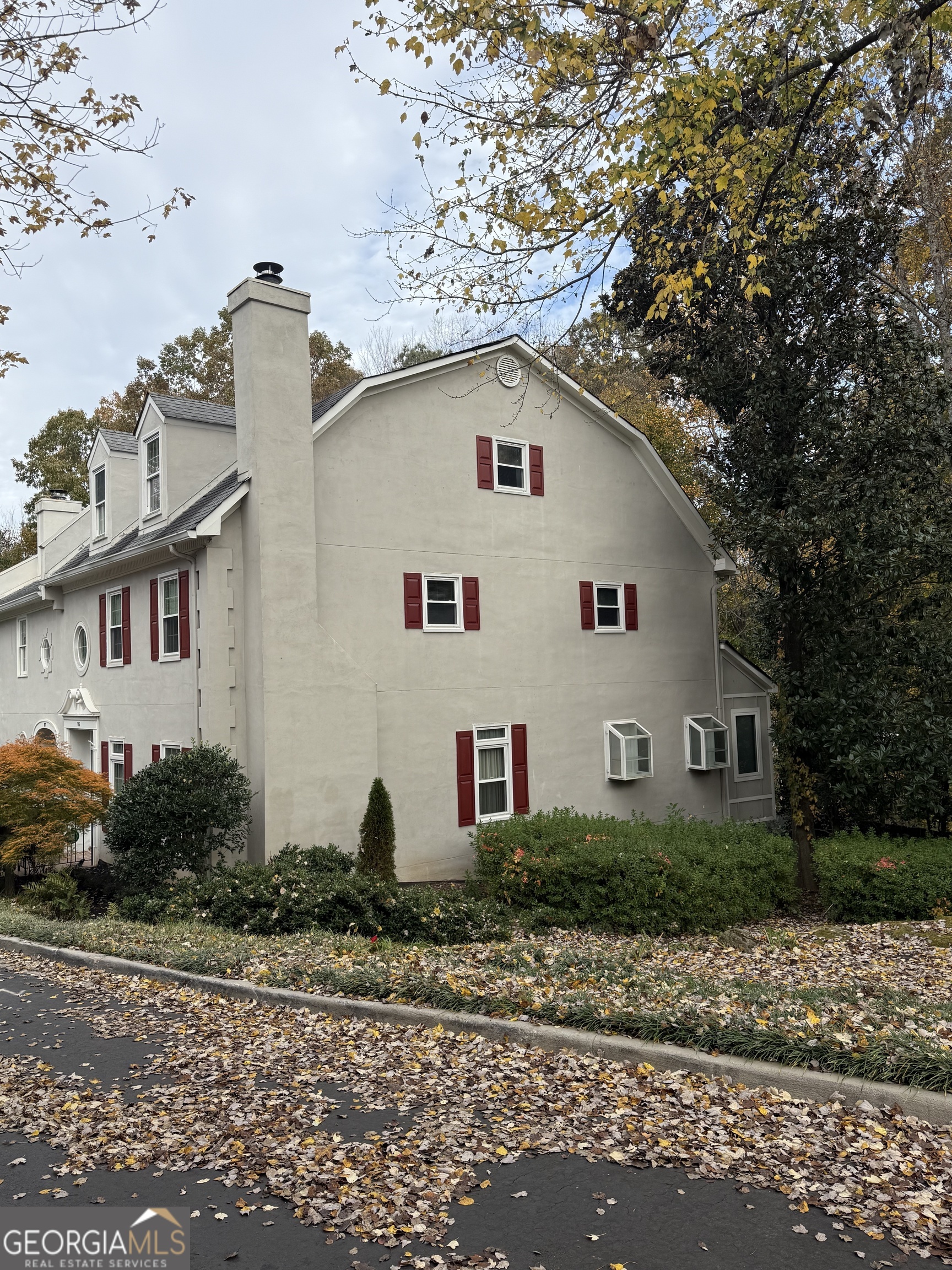 116 Paces Run Atlanta, GA 30339 - Photo 3 of 24 a front view of a house with a yard