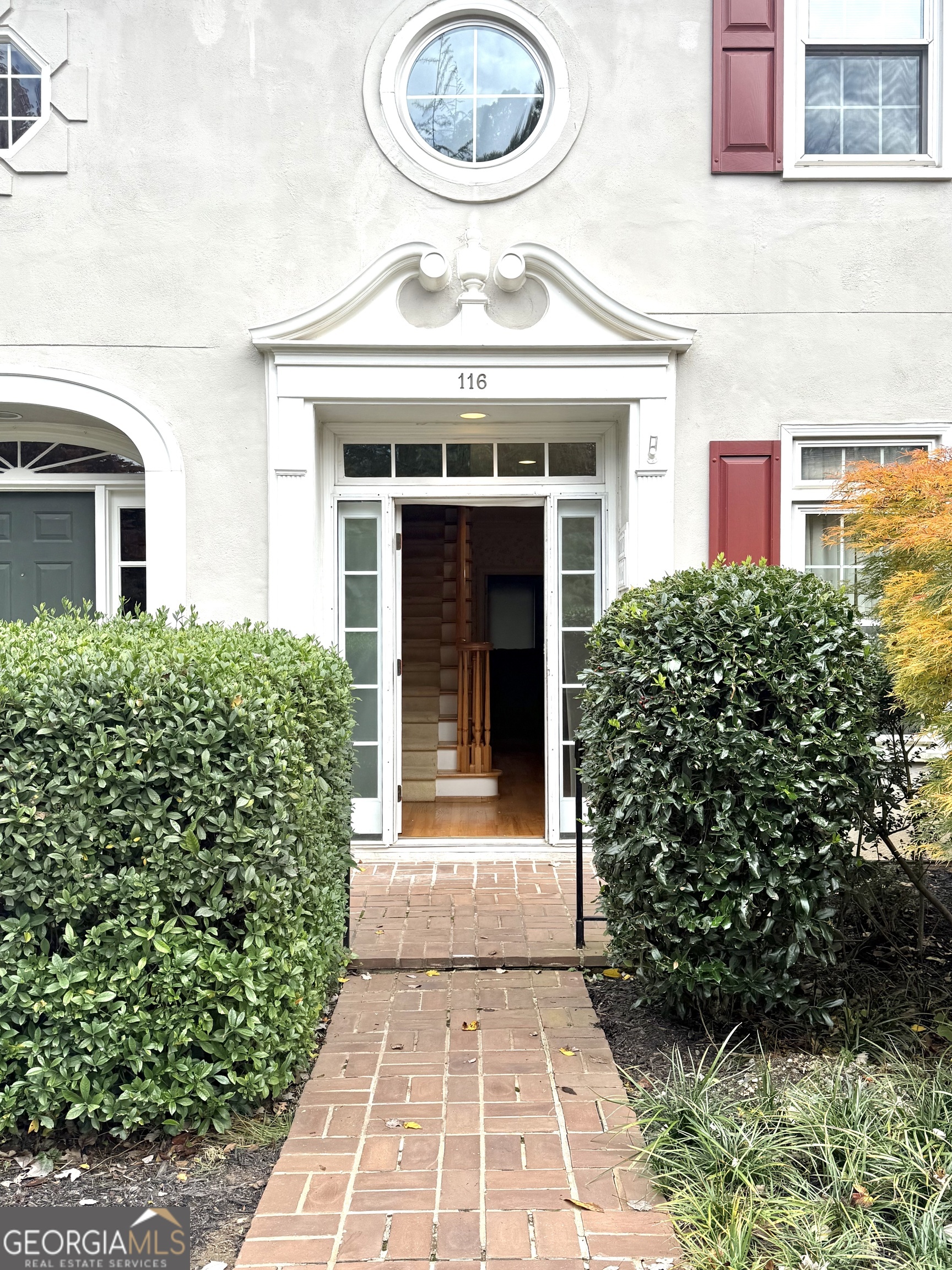 116 Paces Run Atlanta, GA 30339 - Photo 4 of 24 front view of a brick house with a large window