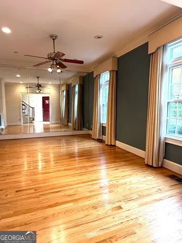 a view of a livingroom with a kitchen
