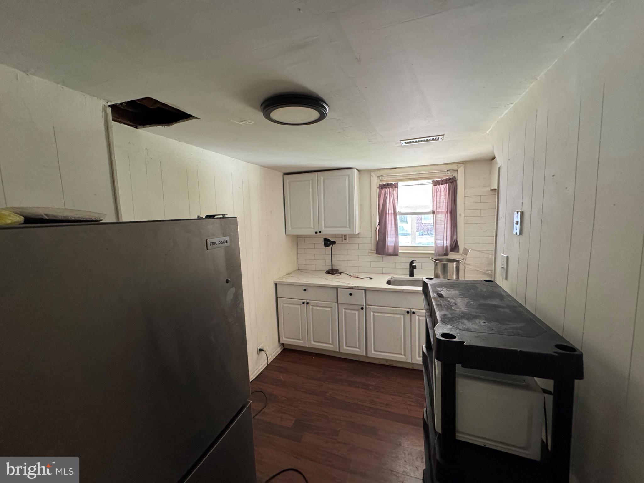 2606 Smithers Street Chester, PA 19013 - Photo 2 of 6 Cozy kitchen with rustic charm.