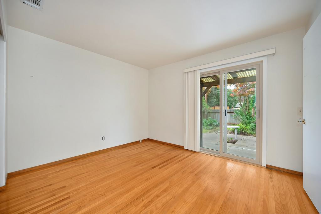 4606 Solano Way Fair Oaks, CA 95628 - Photo 22 of 40 wooden floor in an empty room with a window