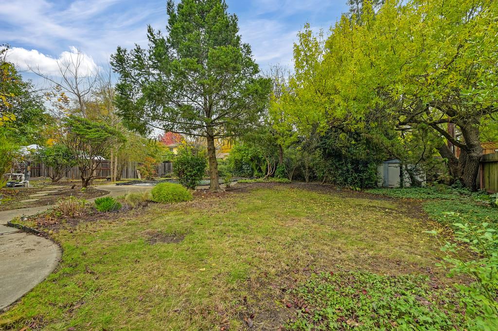 4606 Solano Way Fair Oaks, CA 95628 - Photo 33 of 40 a view of a house with a yard