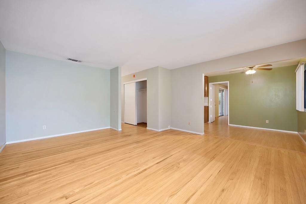 4606 Solano Way Fair Oaks, CA 95628 - Photo 5 of 40 a view of an empty room with wooden floor