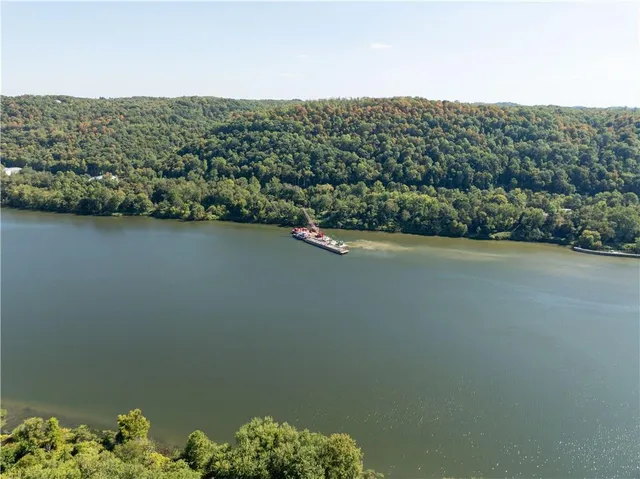 a view of a lake with a mountain in the background
