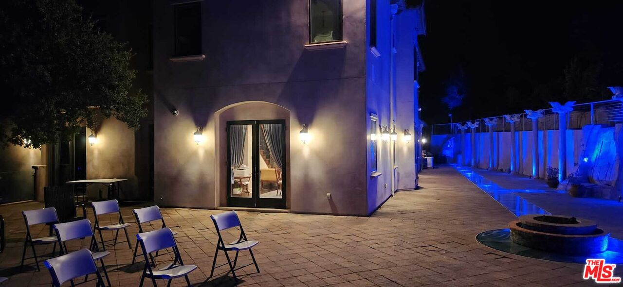 3889 Old Topanga Canyon Road Calabasas, CA 91302 - Photo 12 of 23 a lobby with furniture and chandelier