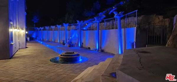 a view of a porch with a potted plant