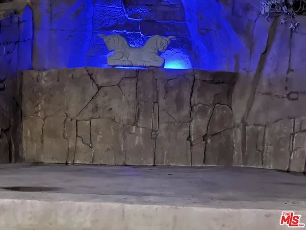 a view of a chairs and tables in patio