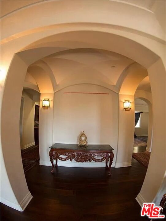 3889 Old Topanga Canyon Road Calabasas, CA 91302 - Photo 9 of 23 a living room with a table and chairs