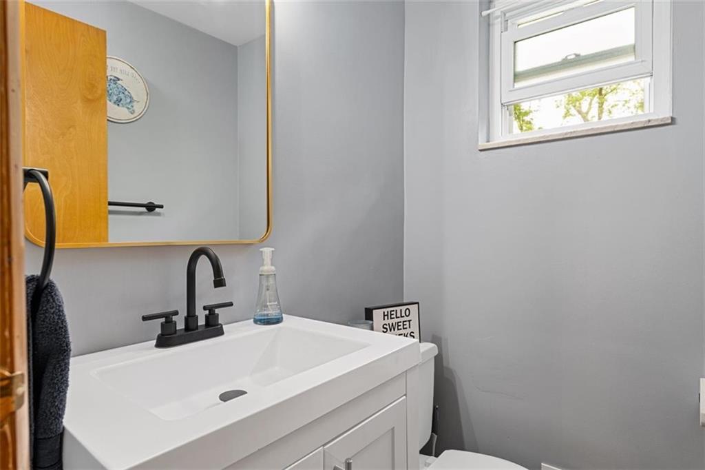 534 Dendron Drive Coraopolis, PA 15108 - Photo 15 of 33 a bathroom with a sink and a mirror