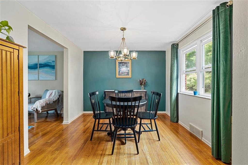 534 Dendron Drive Coraopolis, PA 15108 - Photo 10 of 33 a view of a dining room with furniture window and wooden floor