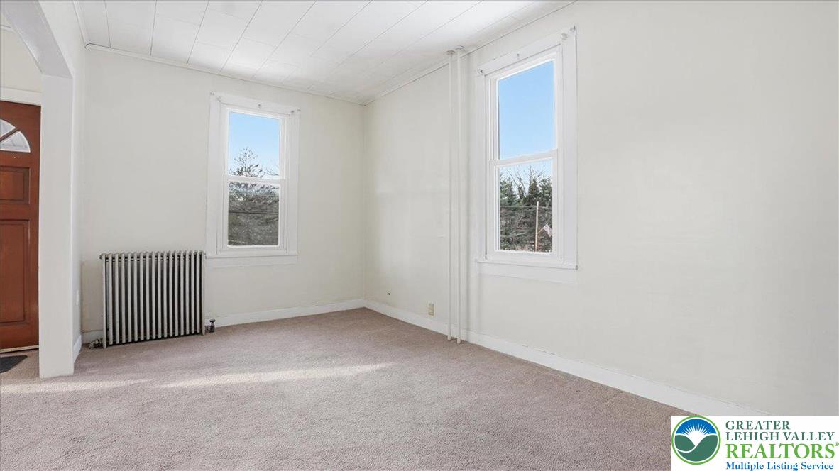 1032 Clamtown Road New Ringgold, PA 17960 - Photo 15 of 68 an empty room with windows