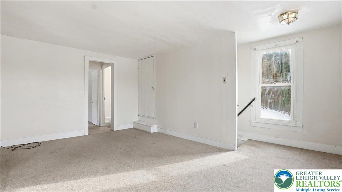 1032 Clamtown Road New Ringgold, PA 17960 - Photo 29 of 68 an empty room with windows