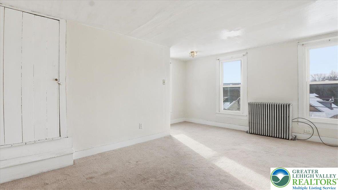 1032 Clamtown Road New Ringgold, PA 17960 - Photo 30 of 68 an empty room with windows