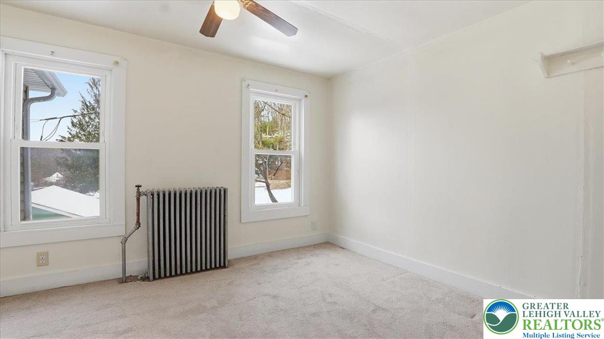 1032 Clamtown Road New Ringgold, PA 17960 - Photo 32 of 68 an empty room with windows