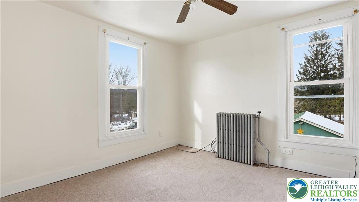 1032 Clamtown Road New Ringgold, PA 17960 - Photo 33 of 68 an empty room with windows