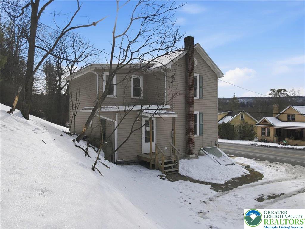 1032 Clamtown Road New Ringgold, PA 17960 - Photo 50 of 68 a view of a house with a yard