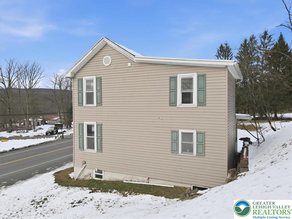 1032 Clamtown Road New Ringgold, PA 17960 - Photo 53 of 68 a front view of a house with a yard