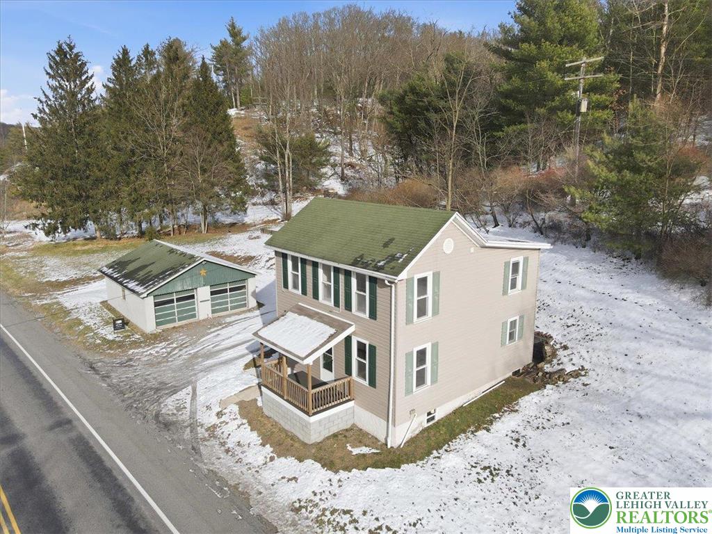 1032 Clamtown Road New Ringgold, PA 17960 - Photo 58 of 68 an aerial view of a house with a yard