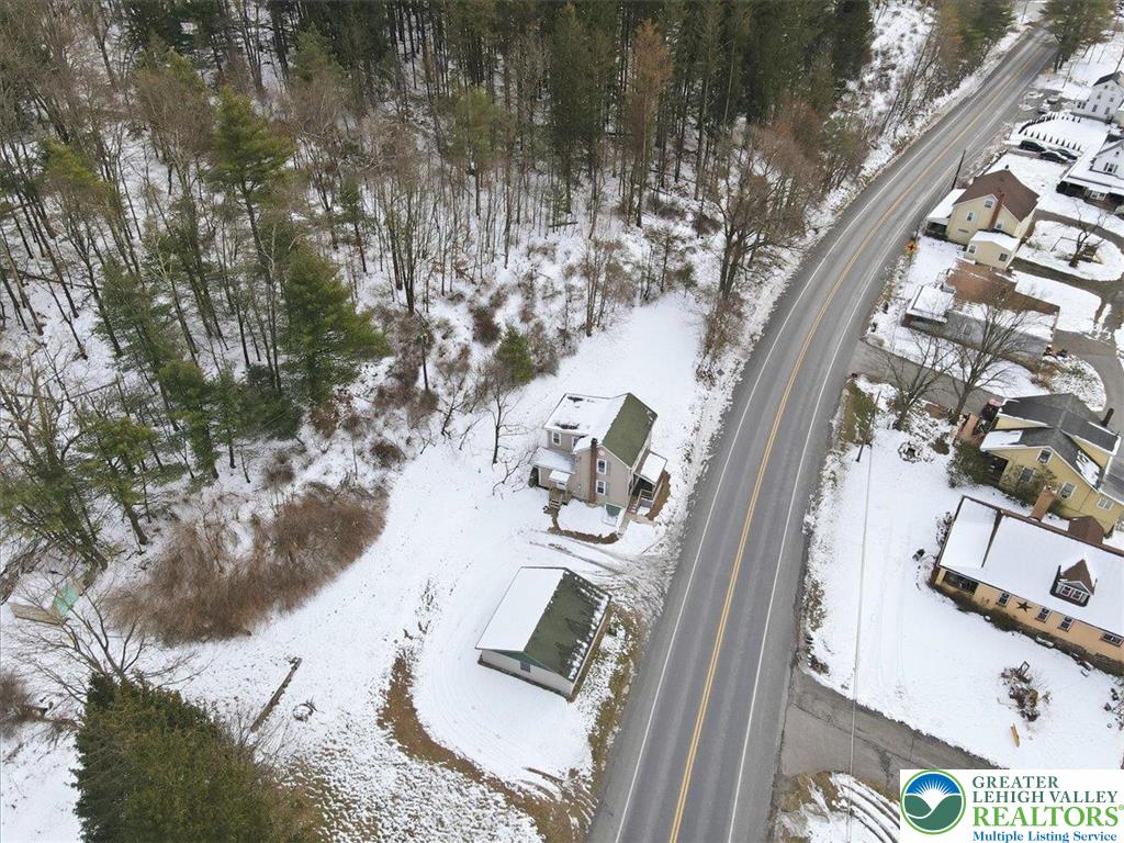 1032 Clamtown Road New Ringgold, PA 17960 - Photo 63 of 68 a view of balcony with furniture and trees