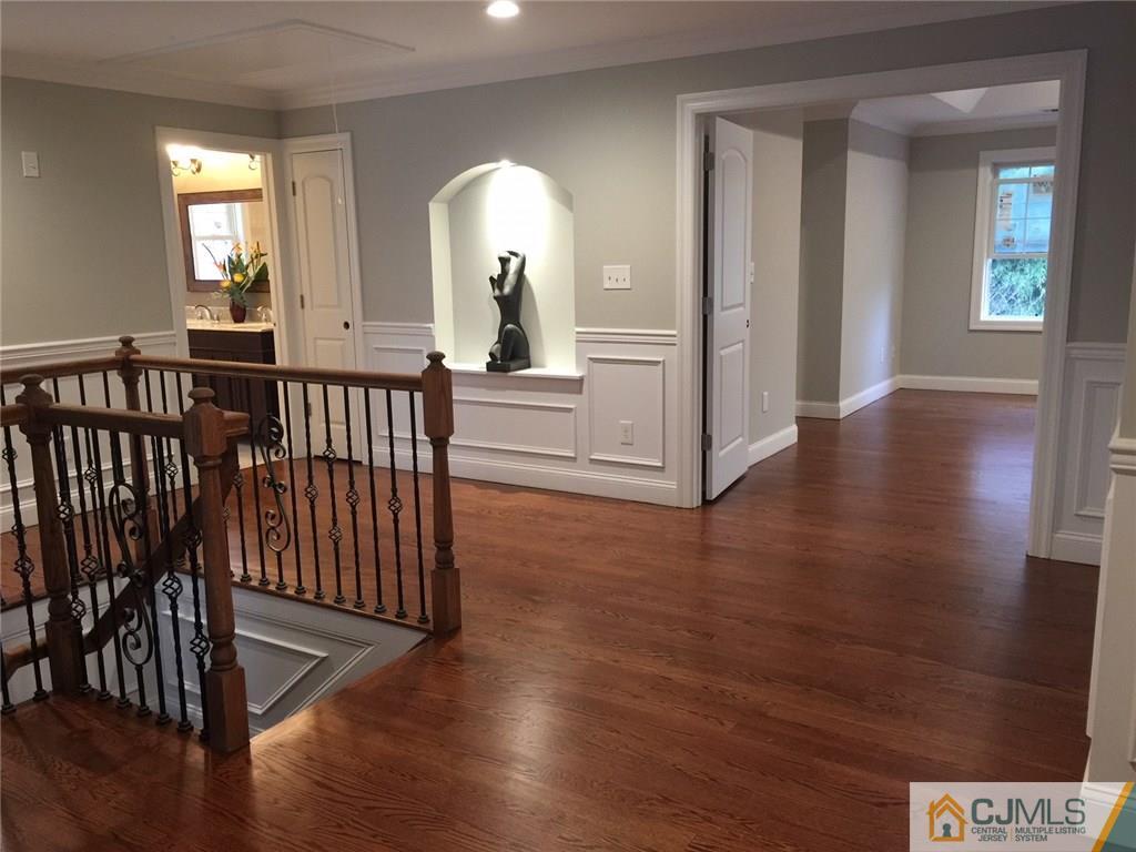216 Oxford Road Edison, NJ 08820 - Photo 4 of 13 a view of entryway with wooden floor