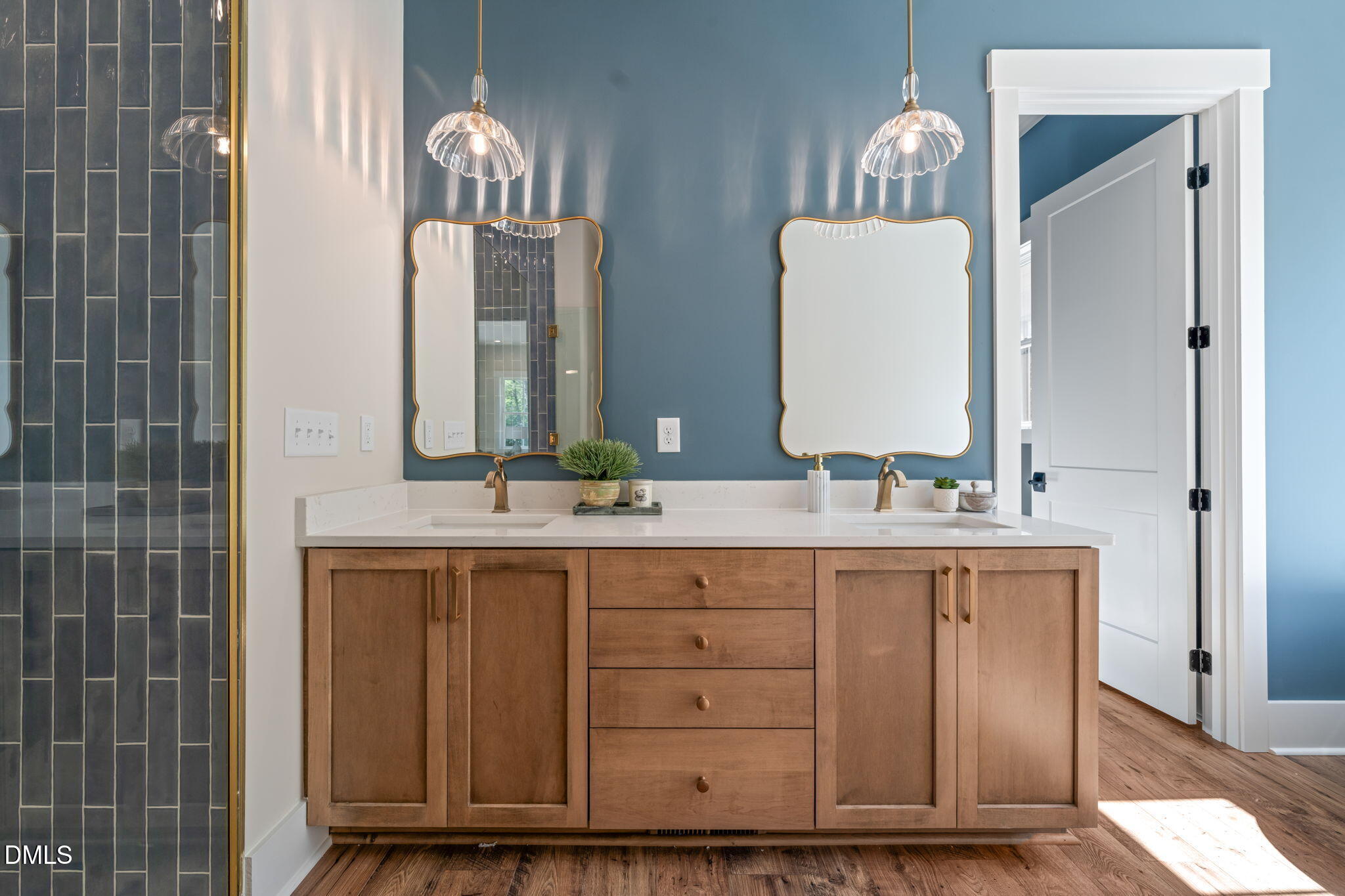 400 Pilot Ridge Road Zebulon, NC 27597 - Photo 28 of 51 a bathroom with double vanity sinks and a mirror
