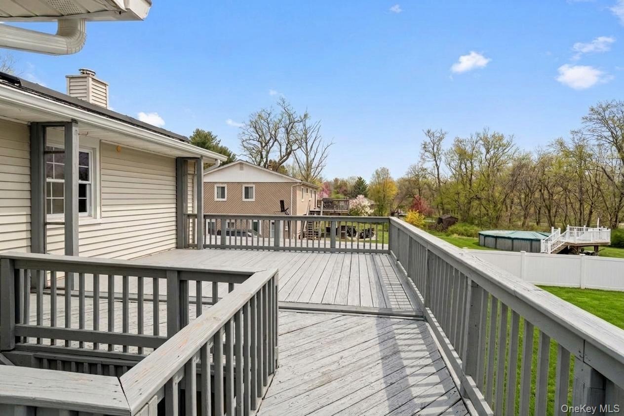 96 Fairmont Road Mahopac, NY 10541 - Photo 30 of 34 Expansive outdoor deck featuring wood-finish flooring and railing
